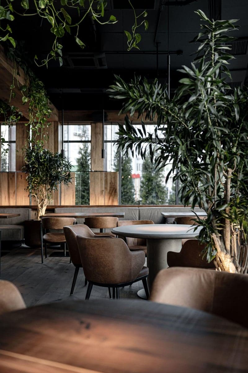 The rooftop dining terrace at Rooftop 1910 overlooking the skyline.