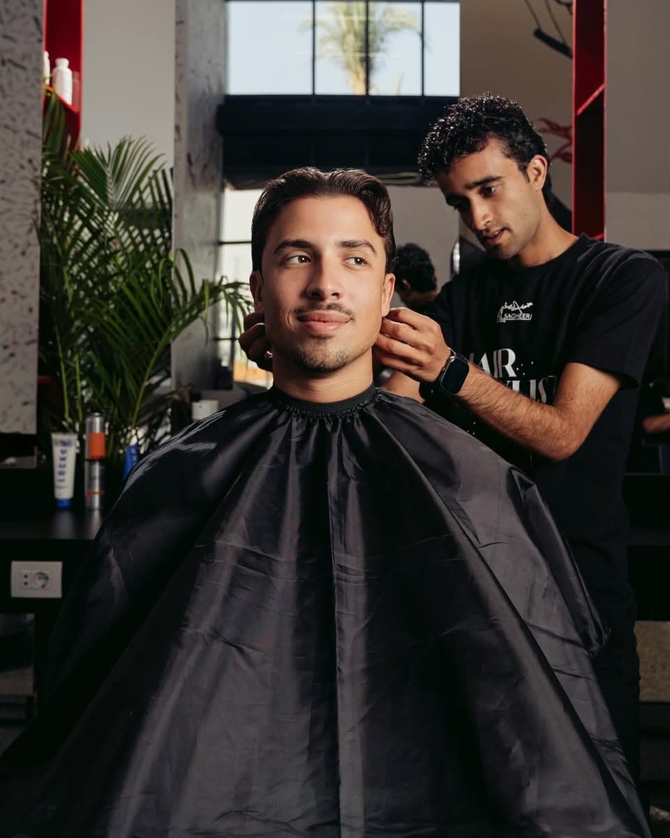 A grooming chair inside Alsagheer Salon.